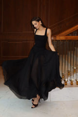 Maxi Dress With Buttons And Asymmetrical Skirt